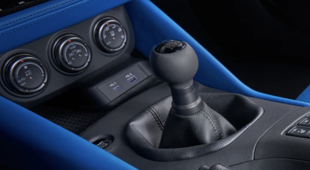 The shift-stick in a 2023 Nissan Z is shown in close up.