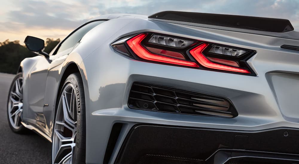 A close up shows the driver side taillight on a silver 2023 Chevy Corvette Z06.