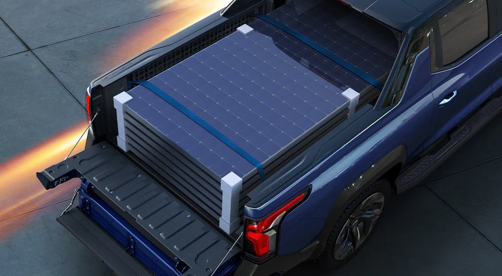 The bed of a 2024 Chevy Silverado EV shows a heavy payload.