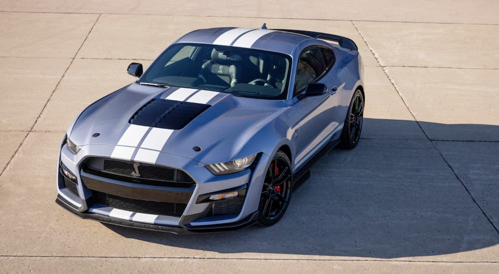 A silver 2022 Ford Mustang Shelby GT500 is shown parked at Ford dealer.