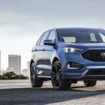 A blue 2019 Ford Edge ST is shown from the front after leaving a Louisville Certified Pre-Owned Ford dealer.