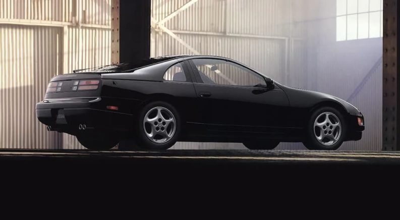 A black 1993 Nissan 300ZX is shown from the side a used Nissan dealership.