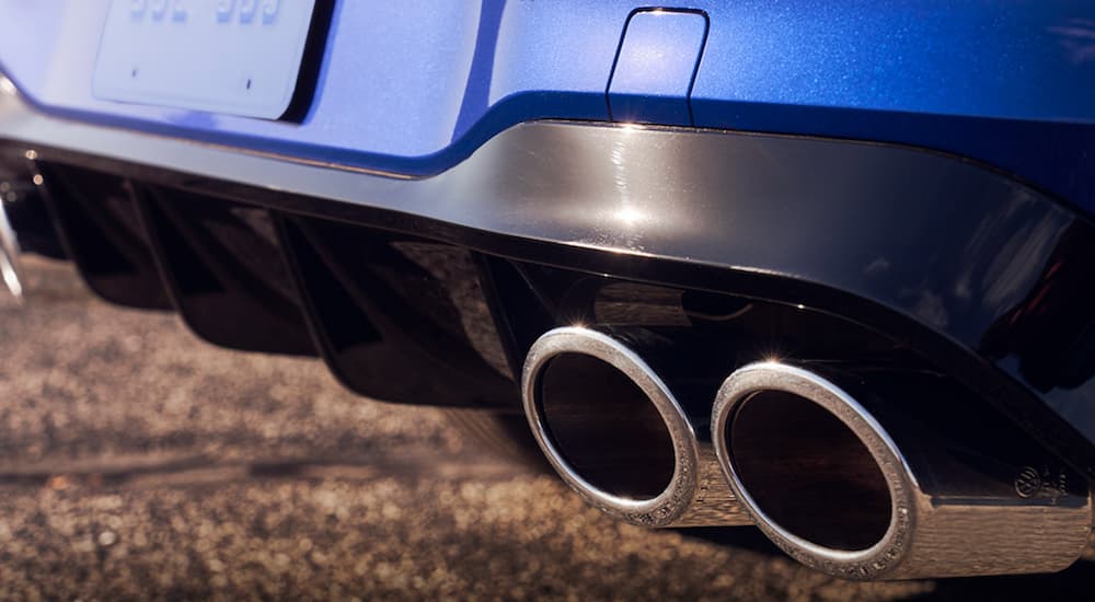 The exhaust of a 2022 Volkswagen Golf R is shown in close up.