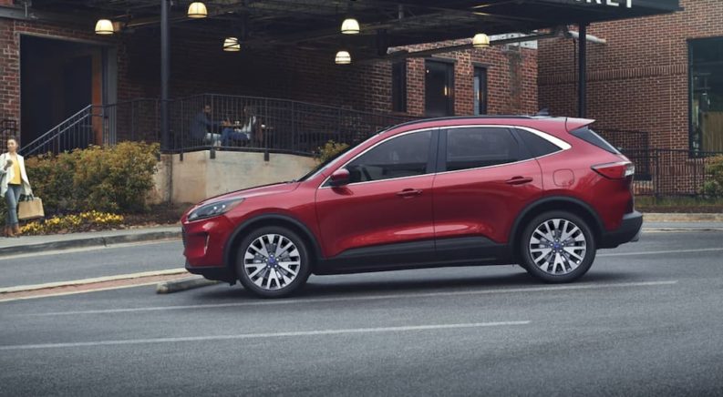2022 Ford Escape is shown from the side parked in a city.