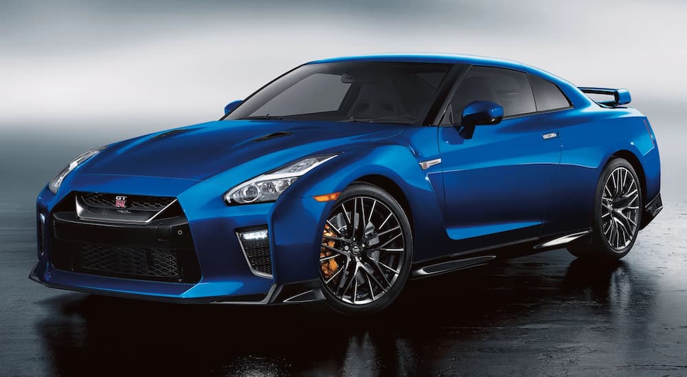 A blue 2021 Nissan GT-R is shown angled left.