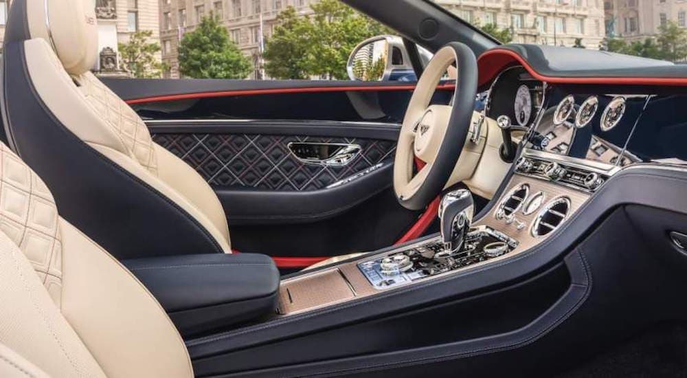 The interior of a Bentley Continental Mulliner is shown from the passenger seat.