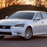 A white 2015 Lexus GS is shown from the front after searching "online car sales."