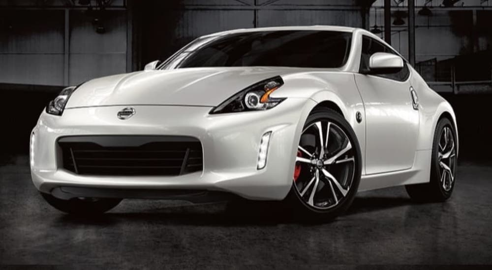 A silver 2020 Nissan 370Z is shown parked in a garage.