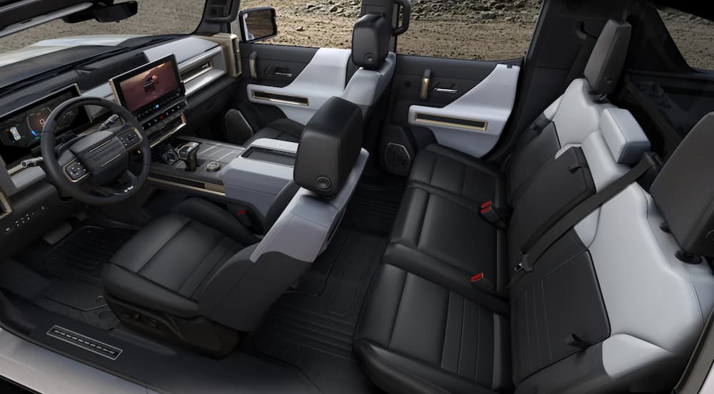 The interior of a 2022 GMC Hummer EV is shown from the drivers side at a high angle.
