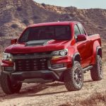 A red 2022 Chevy Colorado ZR2 is shown from the front at an angle after leaving a New Jersey truck dealer.
