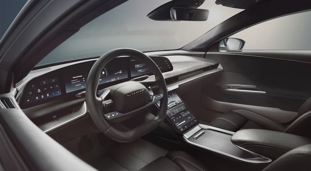 The interior of a 2022 Lucid Air GT is shown from the drivers side window.