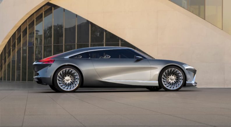 A silver Buick Wildcat EV Concept is shown from the side.