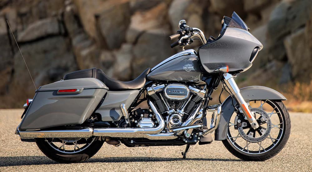 A grey 2022 Harley-Davidson Road Glide Special is shown from the side parked on gravel.