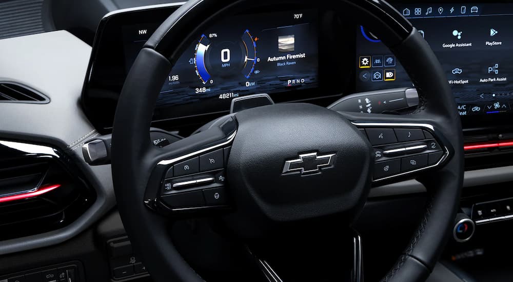 The steering wheel of a 2024 Chevy Silverado EV is shown.