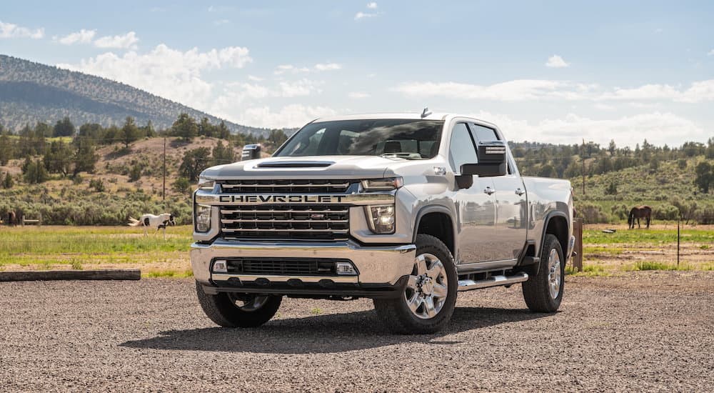 A silver 2022 Chevy Silverado 2500HD is shown from the front at an angle.