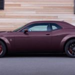 A purple 2022 Dodge Challenger Scat Pack Widebody is shown from the side.