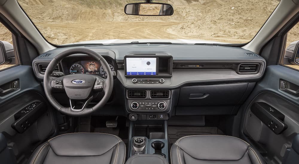The interior of a 2022 Ford Maverick Tremor is shown from above the center console.