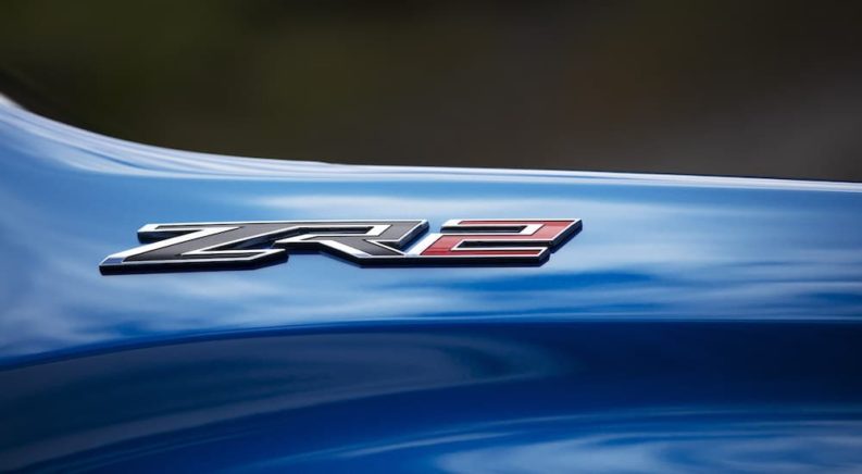 A close up shows the ZR2 badge on a 2023 Chevy Silverado 1500 ZR2.