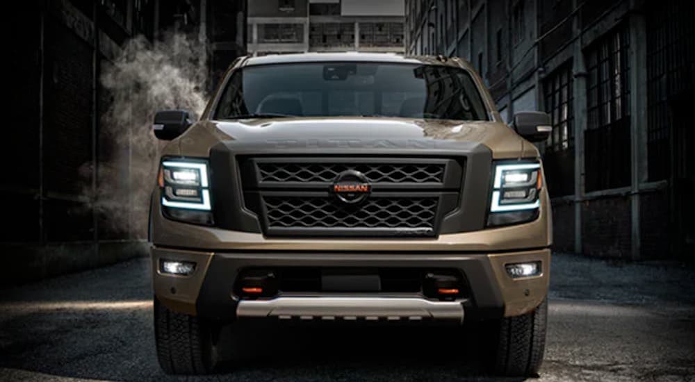 A brown 2022 Nissan Titan is shown from the front after leaving a Nissan Titan dealer.