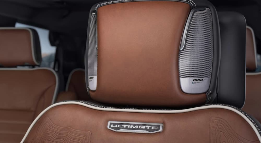 The brown seat in a 2023 GMC Yukon Denali Ultimate is shown in close up.