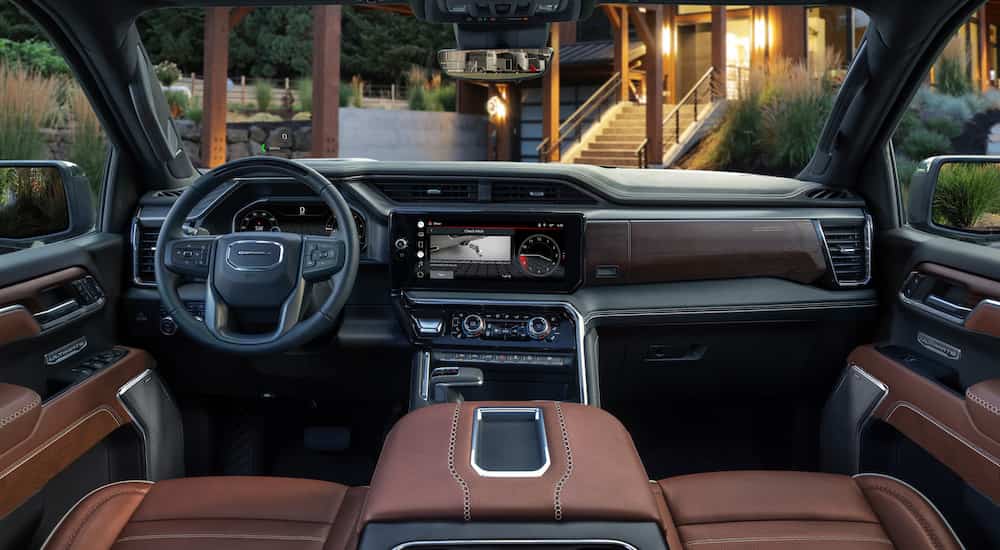 The interior of a 2022 GMC Sierra 1500 Denali Ultimate is shown from above the center console.