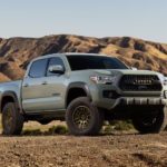 A grey 2023 Toyota Tacoma SR5 Trail Special Edition is shown parked in a desert.