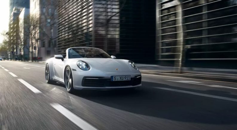 A white 2022 Porsche 911 Carrera is shown after someone decided to sell their car.