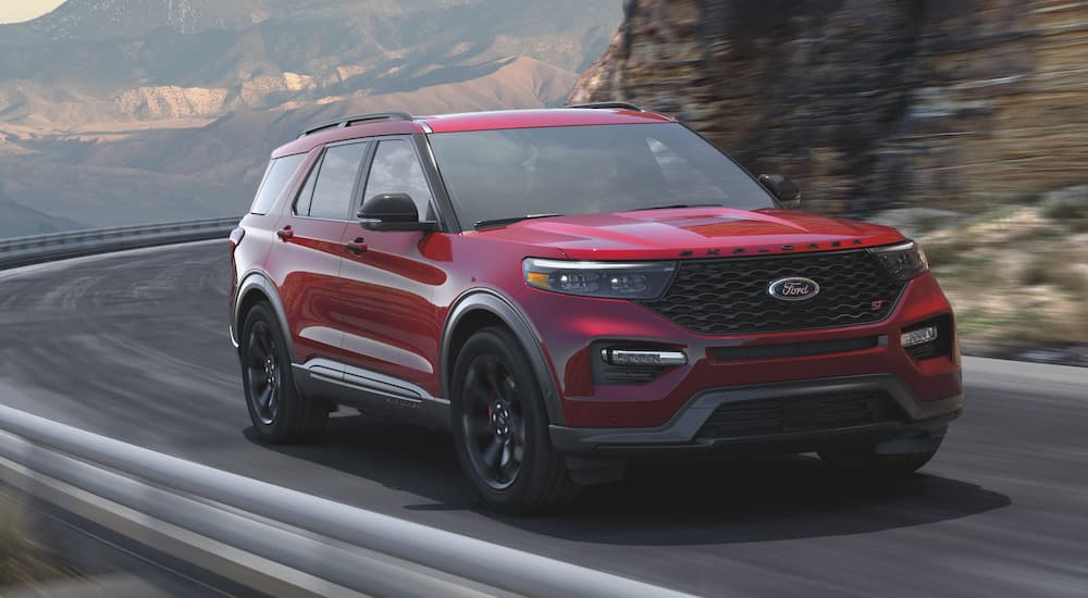 A red 2021 Ford Explorer ST is shown from the front  at an angle after leaving a used Ford dealer.