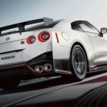 A white 2021 Nissan GTR Nismo is shown from the rear at an angle.