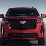 A red 2023 Cadillac Escalade V is shown from the front.