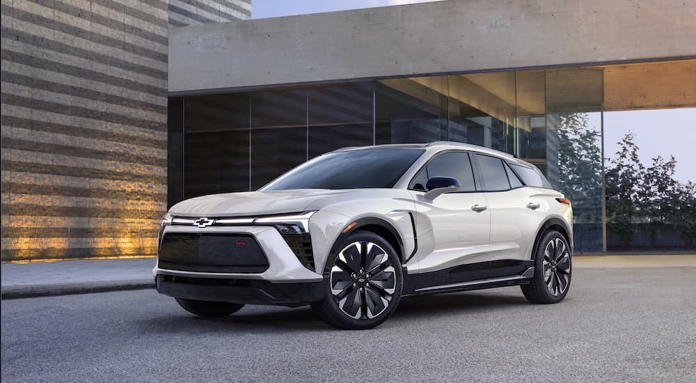 A white 2024 Chevy Blazer EV is shown from the front at an angle.