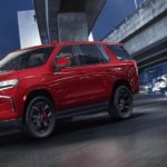A red 2023 Chevy Tahoe RST Performance Edition is shown after leaving a Chevy Tahoe dealer.