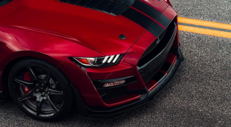 A close up shows the grille on a red 2020 Ford Mustang Shelby GT500 for sale.