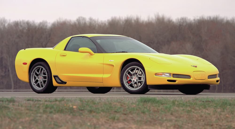 A yellow 2001 Chevy Corvette Z06 is shown after leaving a used Chevy dealer.