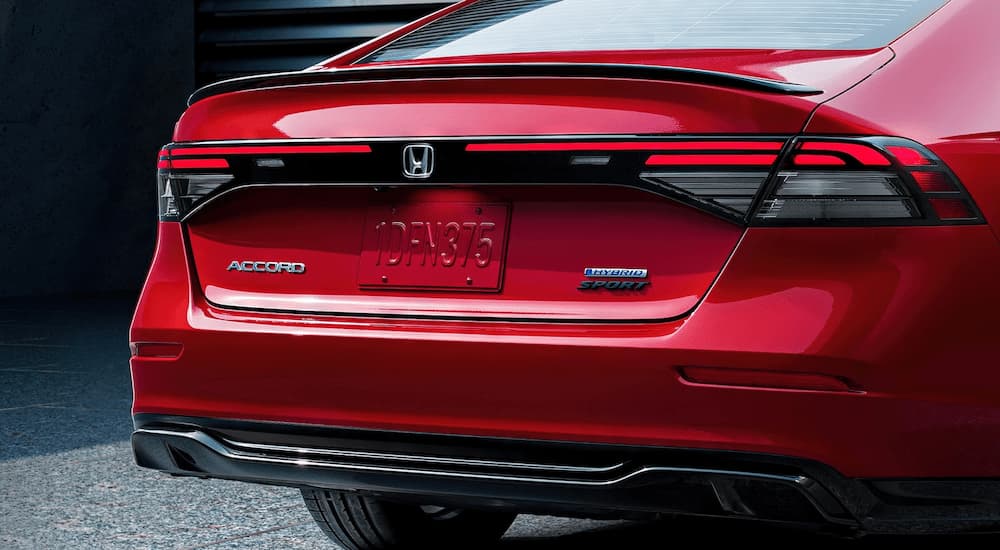 A close up of the rear of a red 2023 Honda Accord Sport Hybrid is shown.
