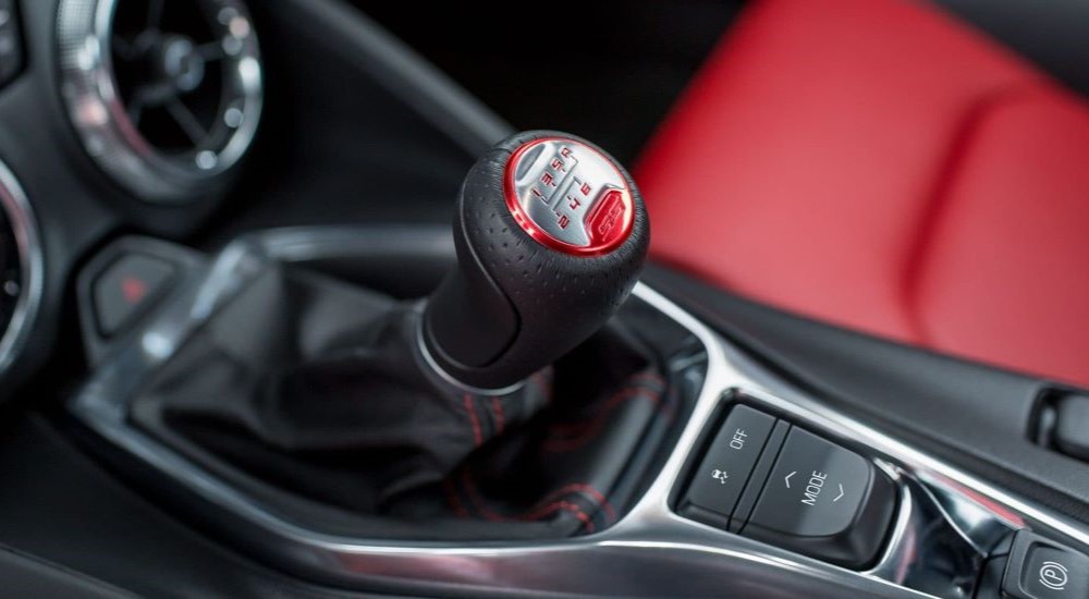 A close up shows the shift knob in a 2023 Chevy Camaro.