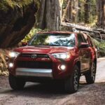 A red 2023 Toyota 4Runner TRD Offroad is shown from the front at an angle.