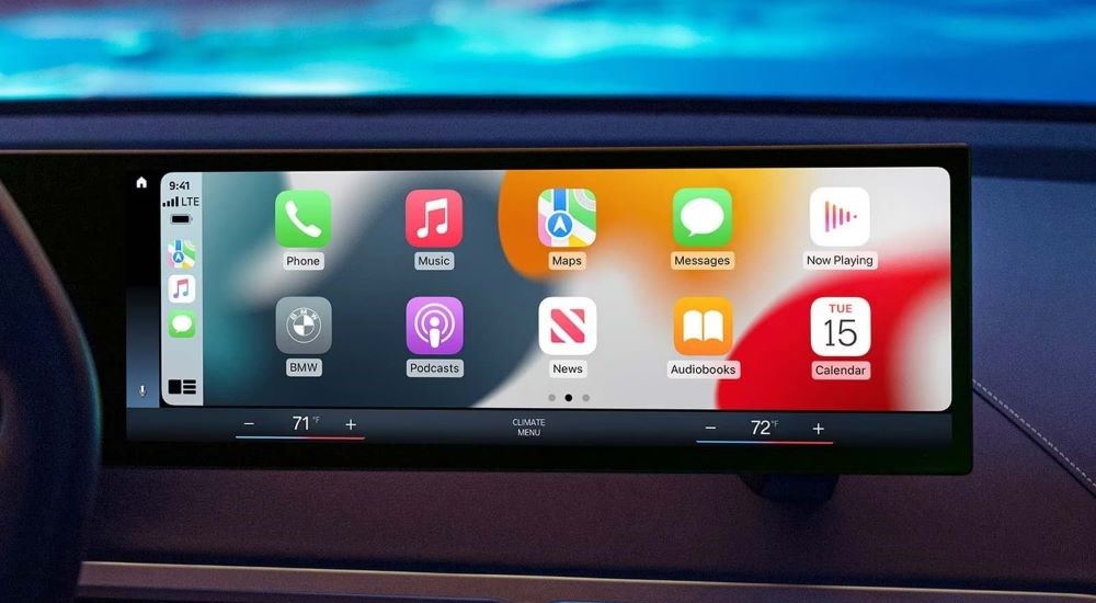 A close up shows the apps on the infotainment screen in a 2024 BMW iX.