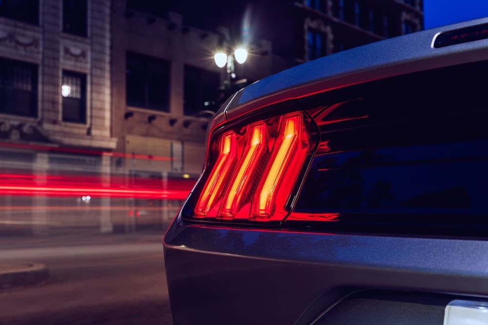 A close up shows the drive side taillight on a 2023 Ford Mustang.