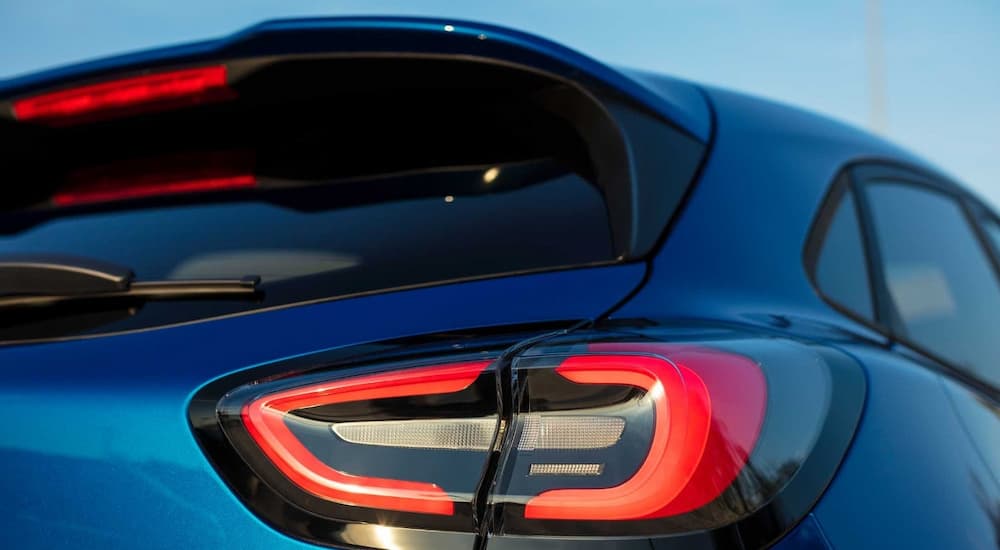 A close up of the rear lift gate of a blue 2023 Ford Puma ST-Line X is shown.