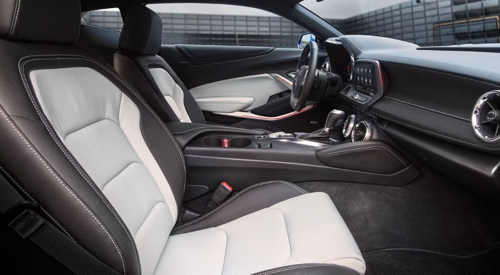 To show the difference in the 2023 Chevy Camaro vs 2023 Nissan Z comparison, the white and black interior of the Camaro is shown. 