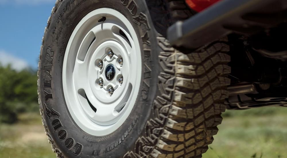 A close up of the white rim on a 2023 Ford Bronco Heritage Edition is shown.