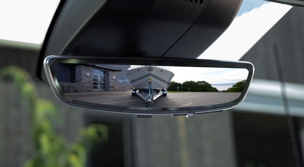 A close up shows the rearview mirror in a 2024 Chevy Silverado 2500HD High Country.