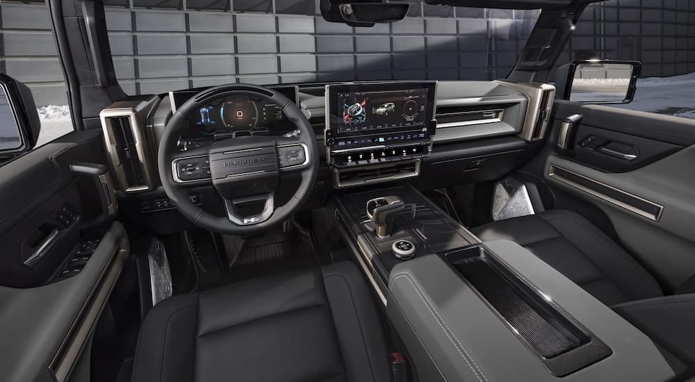 The interior of a 2024 GMC Hummer EV SUV is shown from the drivers seat after leaving a GMC dealer.