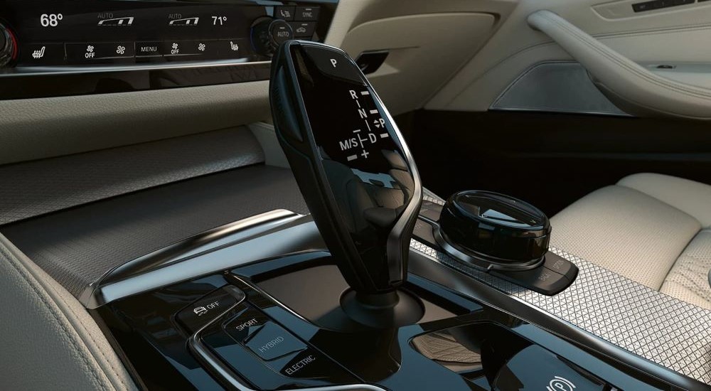 A close up shows a shifter in a 2023 BMW 5 Series for sale.