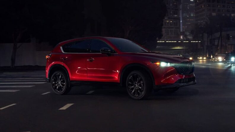A red 2023 Mazda CX-5 for sale is shown.