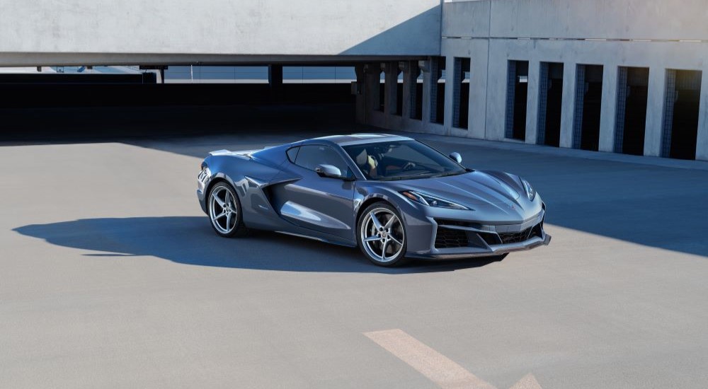 A gray 2024 Chevy Corvette E-Ray 3LZ is shown parked outside.