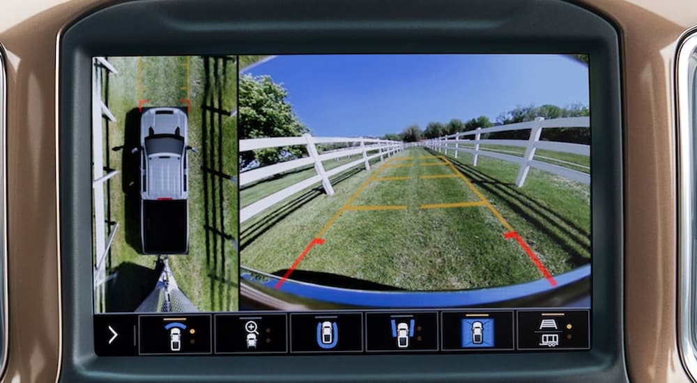 Multiple trailering camera views are shown on the infotainment screen of a 2023 Chevy Silverado 2500 HD for sale.