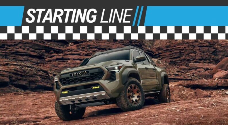 A green 2024 Toyota Tacoma Trailhunter is shown under a starting line banner.