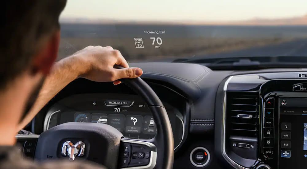 The driver's view of a 2023 Ram 1500, showing its head up display and digital driver's display.